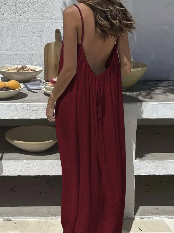 Backless Spaghetti Strap Maxi Dress ~ Flowy comfort with a striking silhouette.