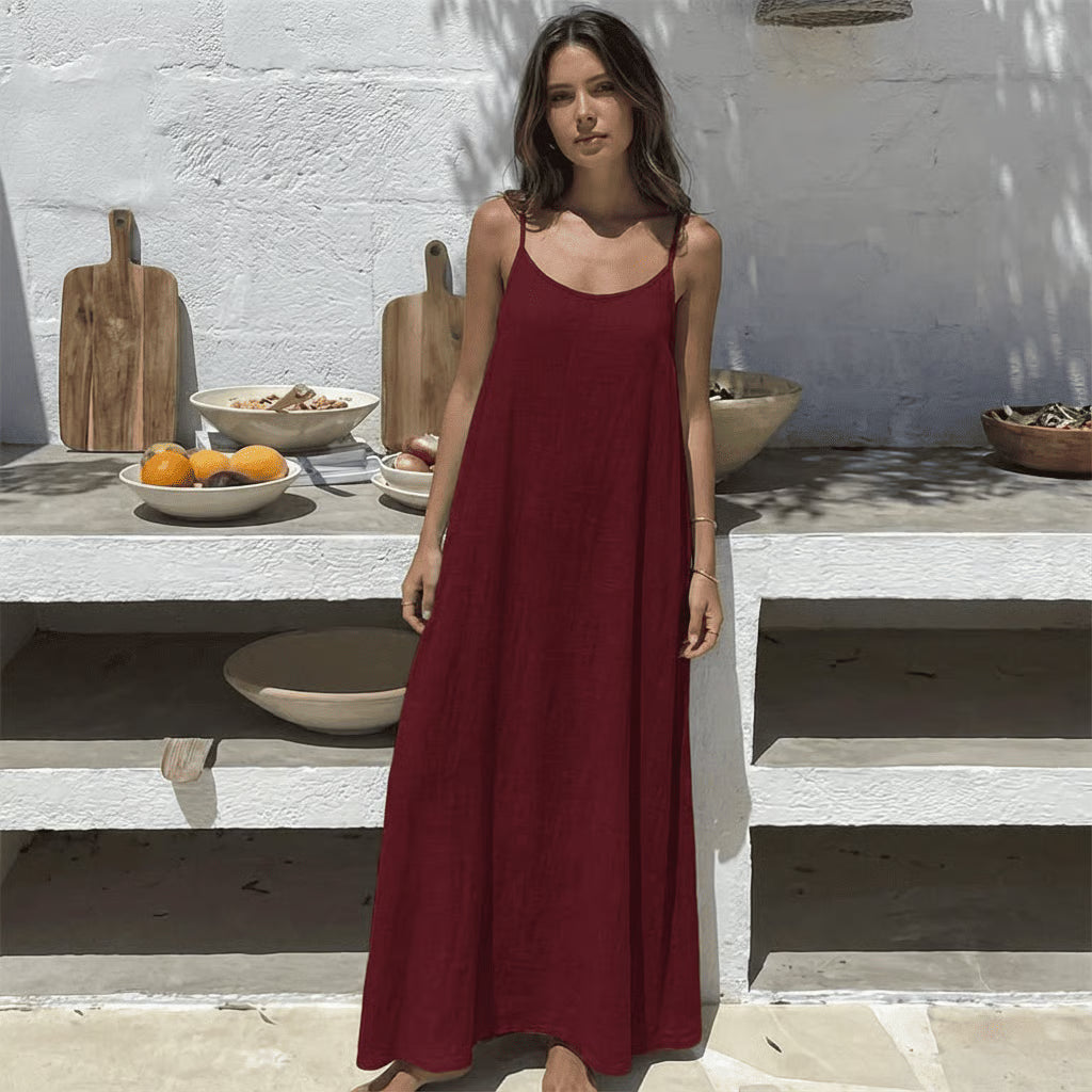 Backless Spaghetti Strap Maxi Dress ~ Flowy comfort with a striking silhouette.