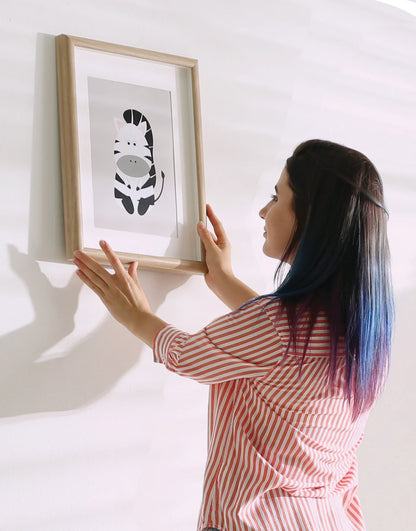 Hang Hero ~ The easiest way to hang pictures straight.